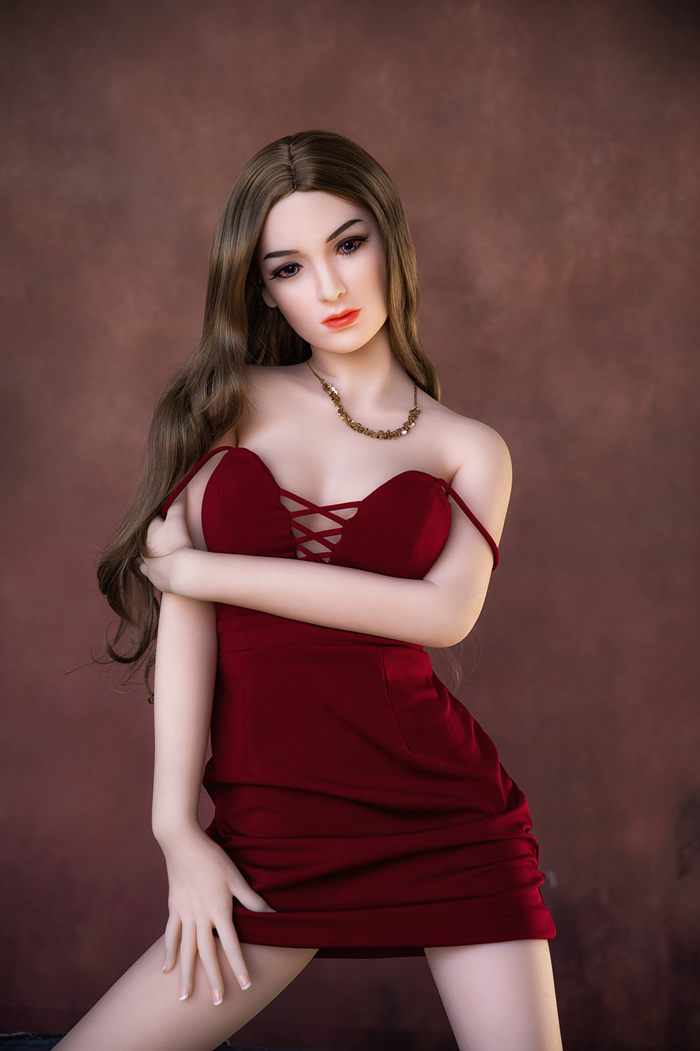 SY doll on sale - a sexy sy doll with black eyes black curly long hair wearing a chic choker and long gloves in a super sexy tight black leather pencil dress with two silver hoop earings